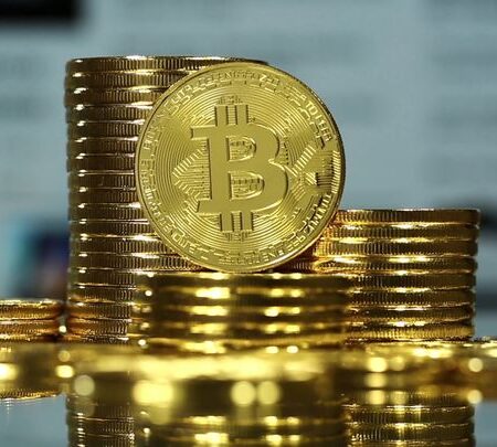 Bitcoin drops below $60,000, Ether falls amid broad crypto dip